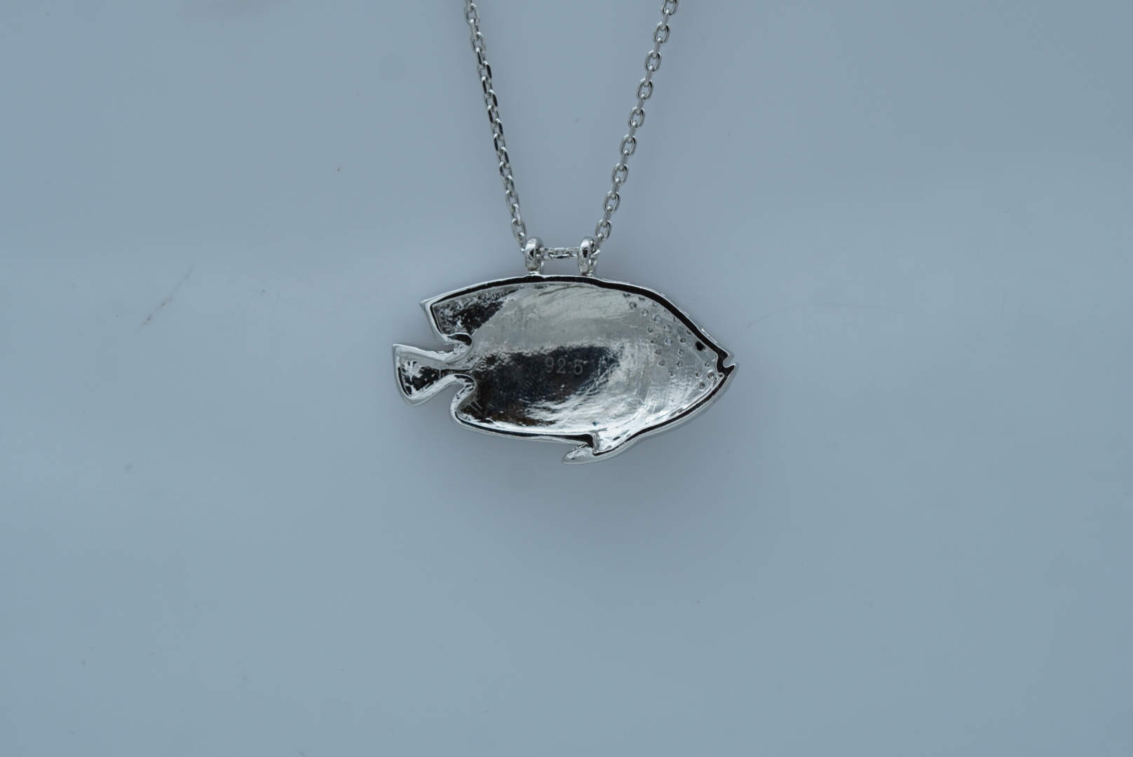 GLOWING AQUA FISH SILVER PENDANT