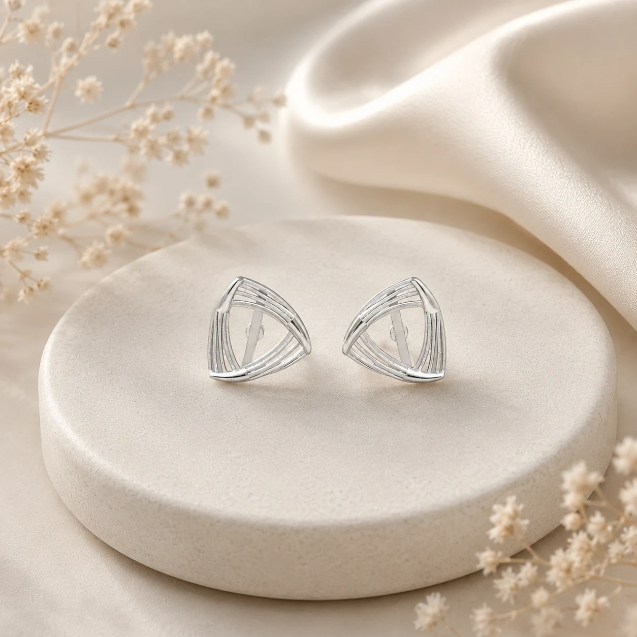 Ribbed triangular sterling silver stud earrings from the silver jewellery under ₹2,500 edit