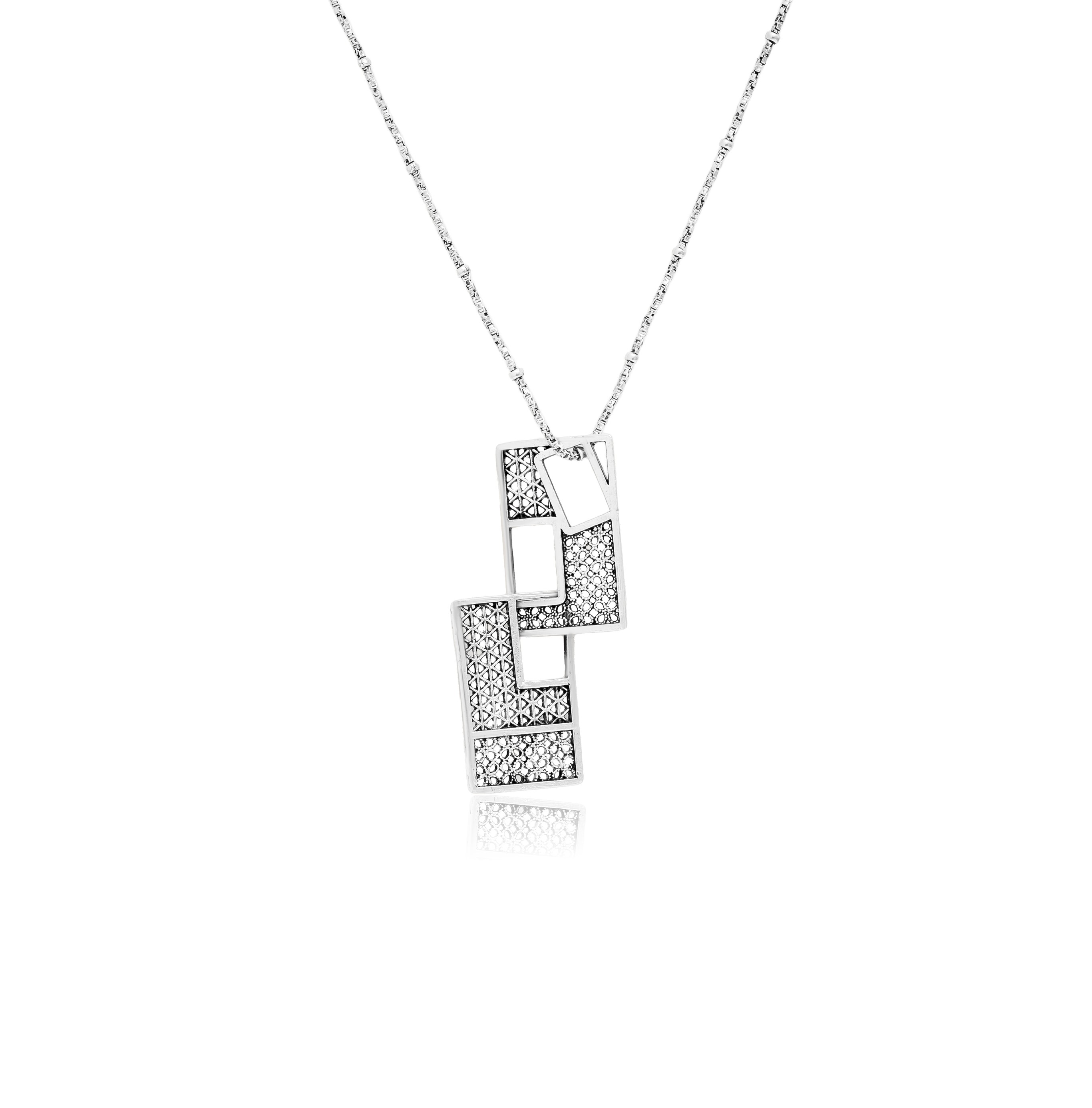 QUIRKY SILVER PENDANT